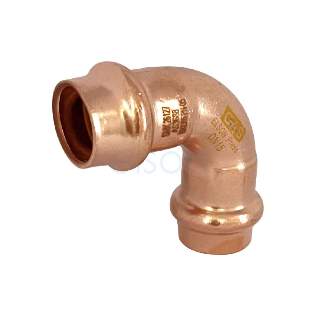 Copper elbow pipe fitting on a white background