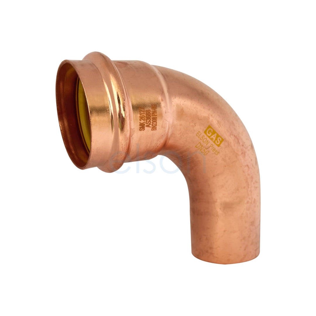 Copper elbow pipe fitting on a white background