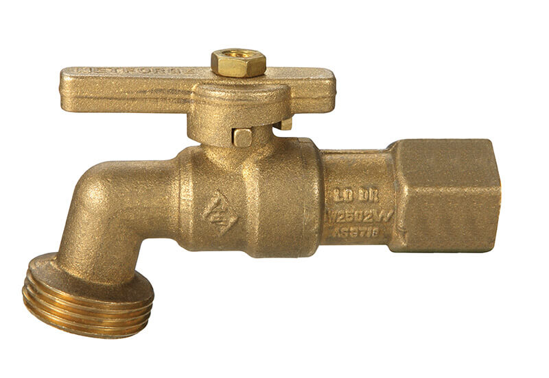 Brass plumbing valve on a white background