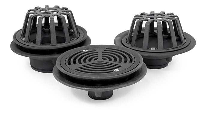 Three black cast iron roof drains with different grate options.