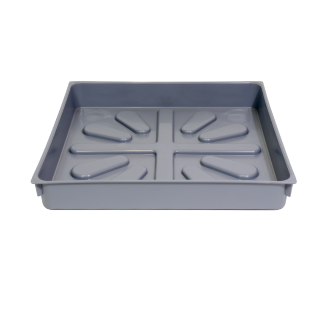 Gray mold tray with various shapes on a white background