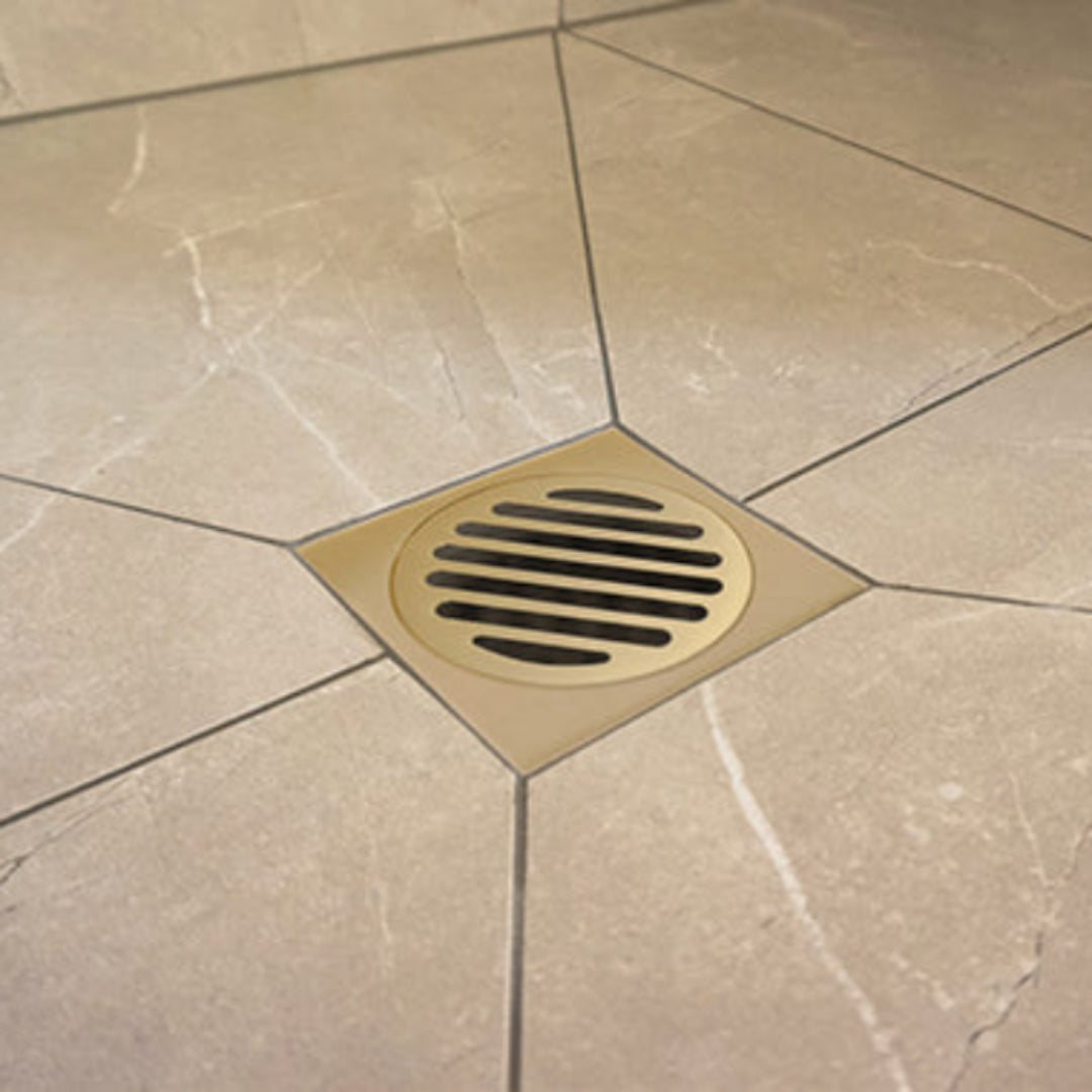 Tile grate in situ with beige bathroom tiles