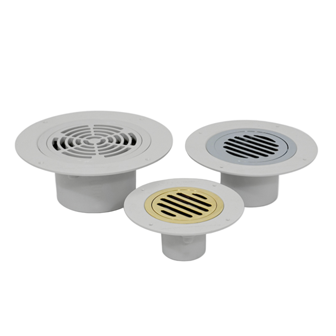 Three gray drain covers with different designs on a white background
