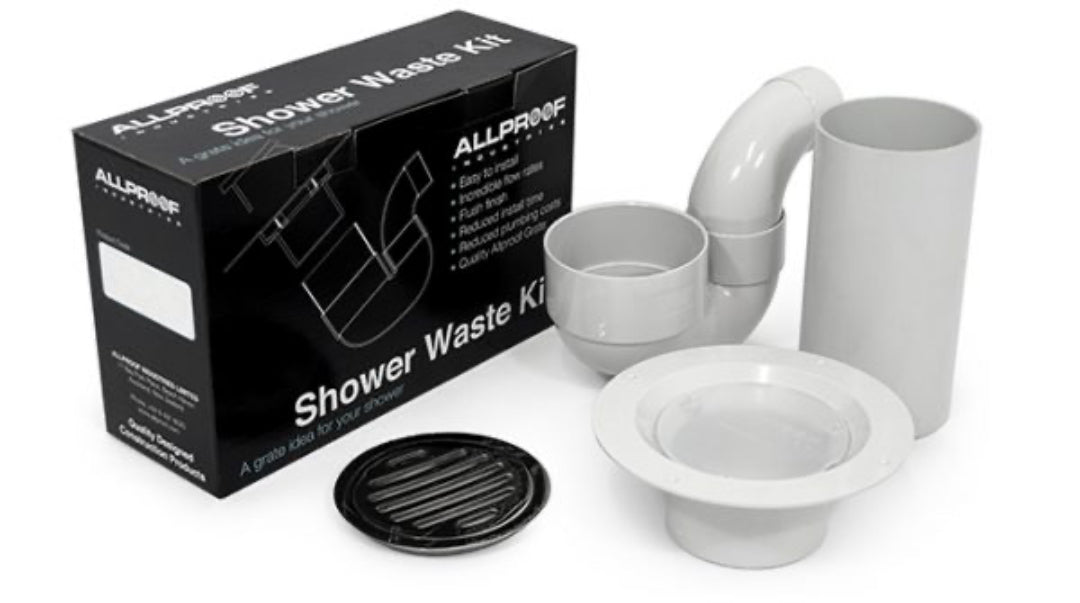 A Vinyl Shower Waste Kit by Allproof, including components such as pipes, a gully trap, a riser, and a cam-lock grate, all displayed alongside the product packaging.