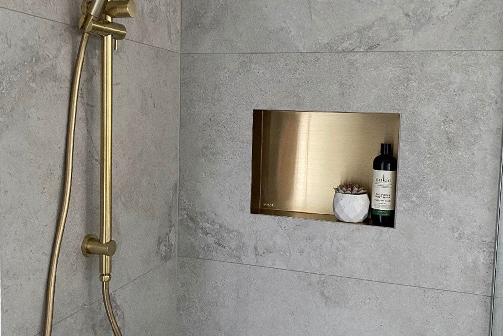 Anook stainless steel shower niche installed in a tiled shower