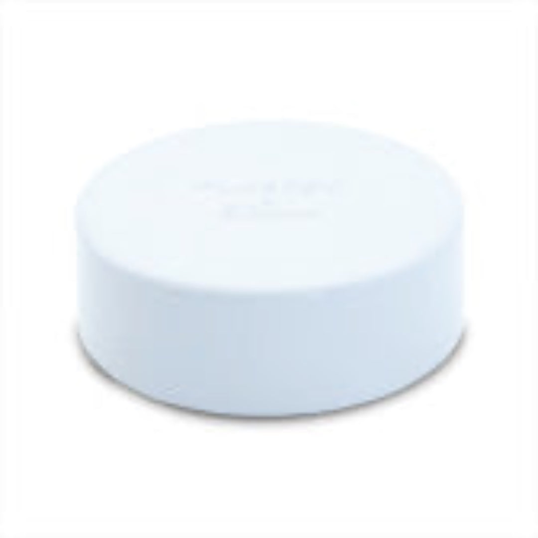 A white, solid-colored, round plumbing end cap with no visible branding or markings.