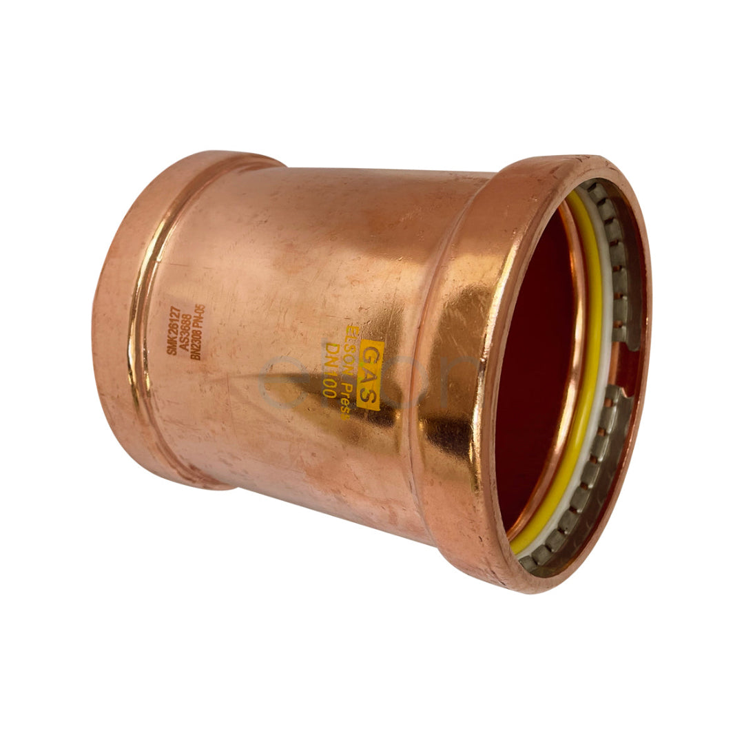 Bronze pipe fitting with yellow center on a white background