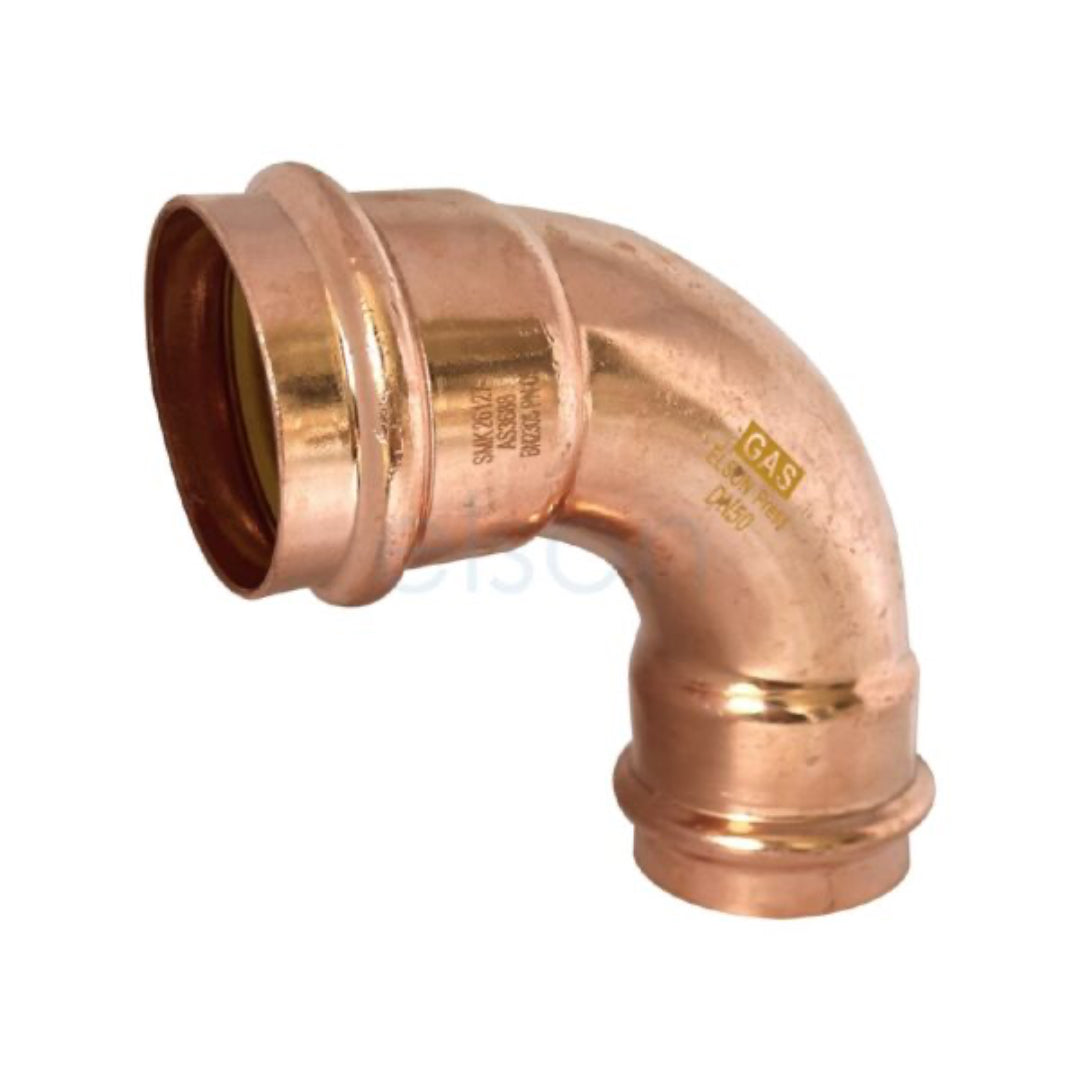 Copper elbow pipe fitting on a white background