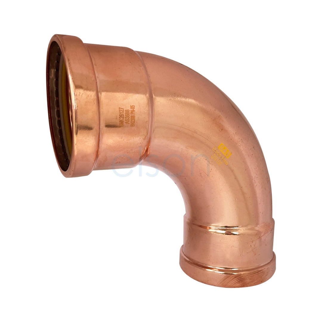 Copper elbow pipe fitting on a white background
