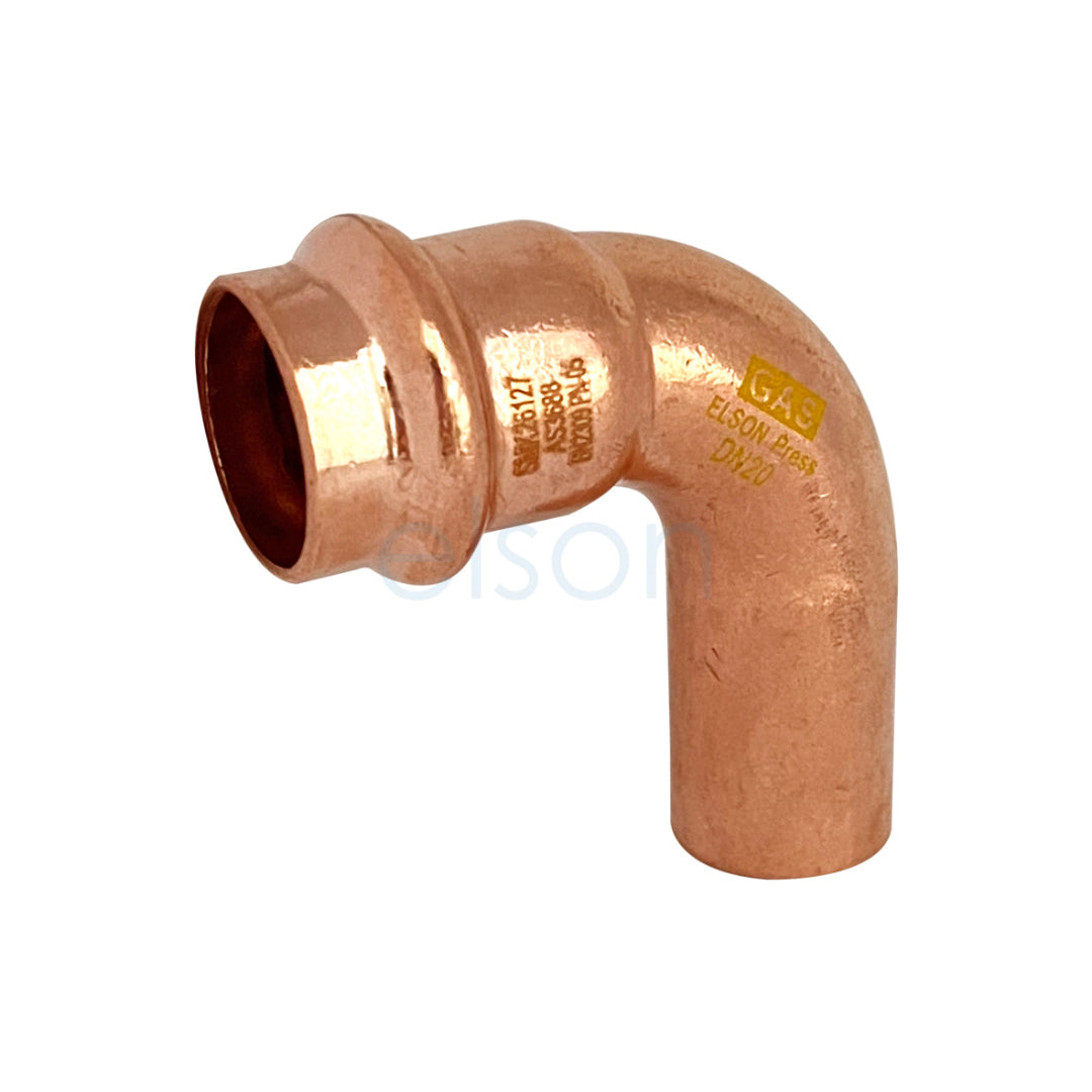 Copper elbow pipe fitting on a white background