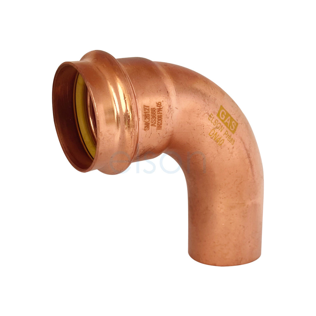 Copper elbow pipe fitting on a white background