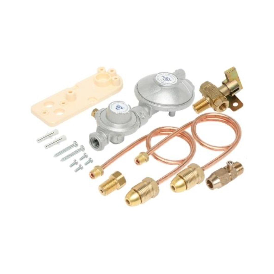 Set of plumbing components including a valve, connectors, and a wooden block on a white background.