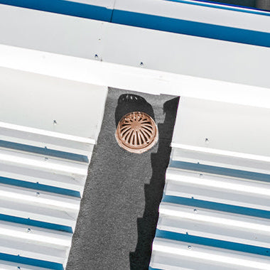 Bronze roof drain installed 