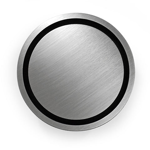 A stainless steel bathroom drain with a round-in-square design