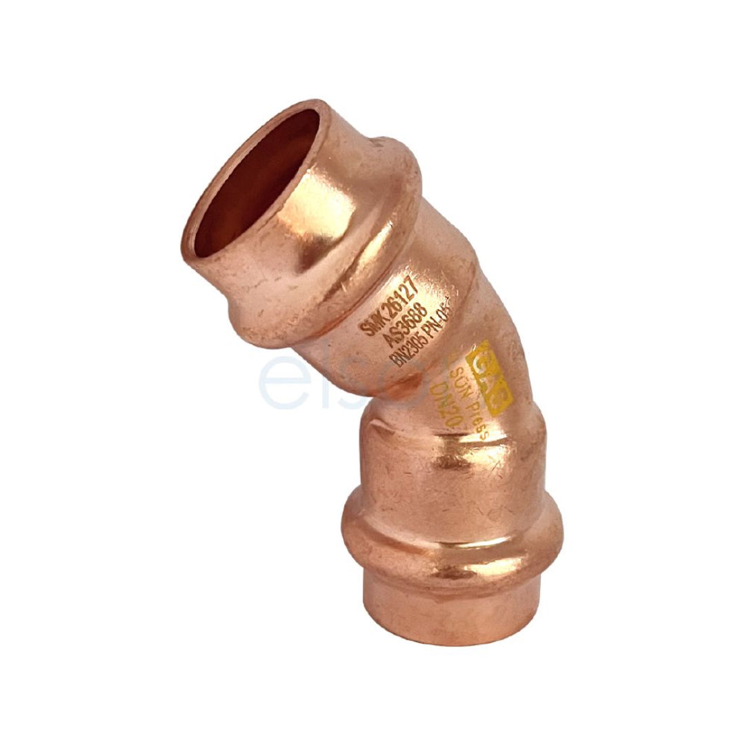 Copper elbow pipe fitting on a white background