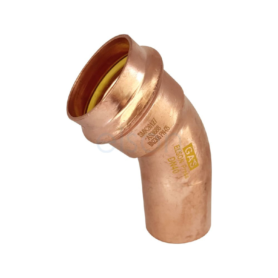 Copper elbow pipe fitting on a white background