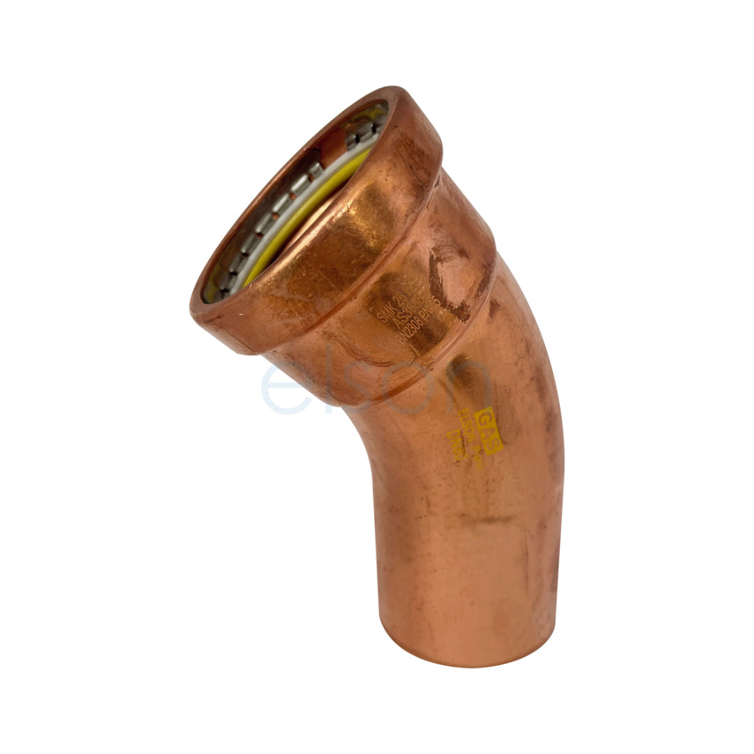 Copper elbow pipe fitting on a white background