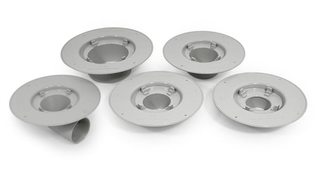 Five metallic circular components on a white background