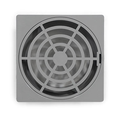 A gray metal stormwater grate with a circular pattern design.