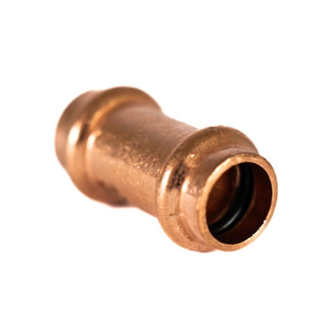 A copper press slip coupling fitting for plumbing.